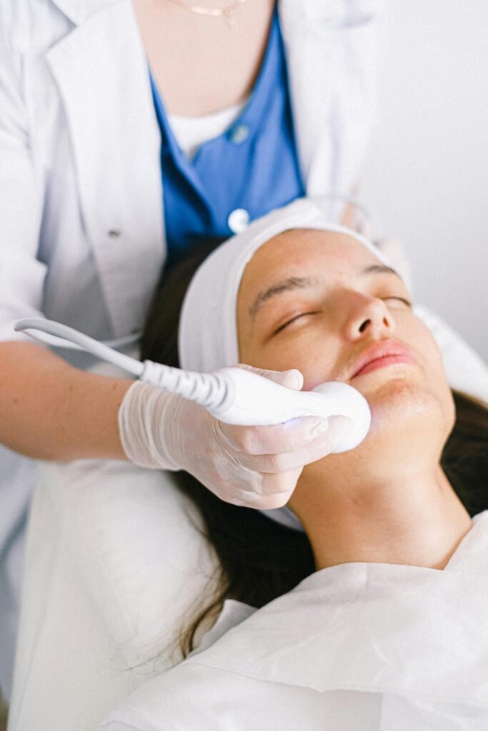 pexels-photo-5069423-5069423 Beautician doing ultrasonic face cleaning for young client